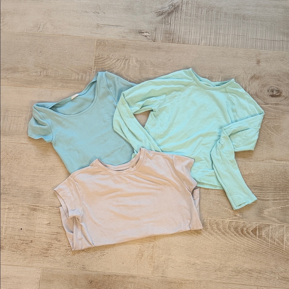 Set of Three Long Sleeve and Short Sleeve Athleta Girl Tops